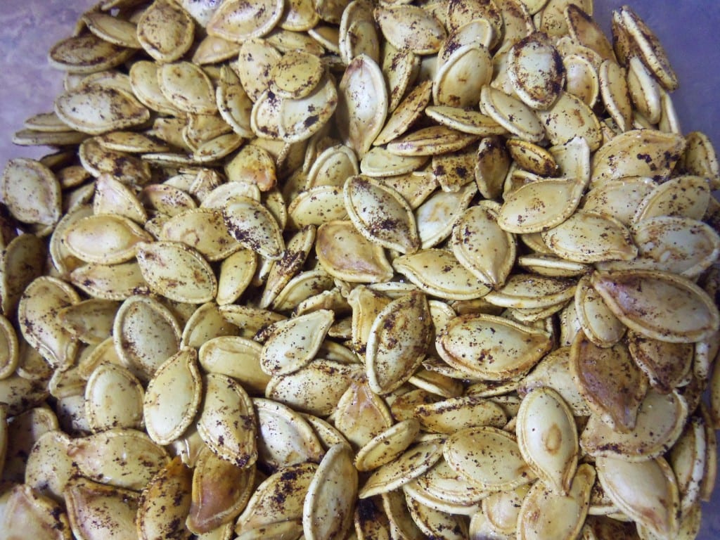 Learn how to spice roasted pumpkin seeds. Make them sweet or salty. Pumpkin seeds are full of nourishment and make a healthy snack alternative.
